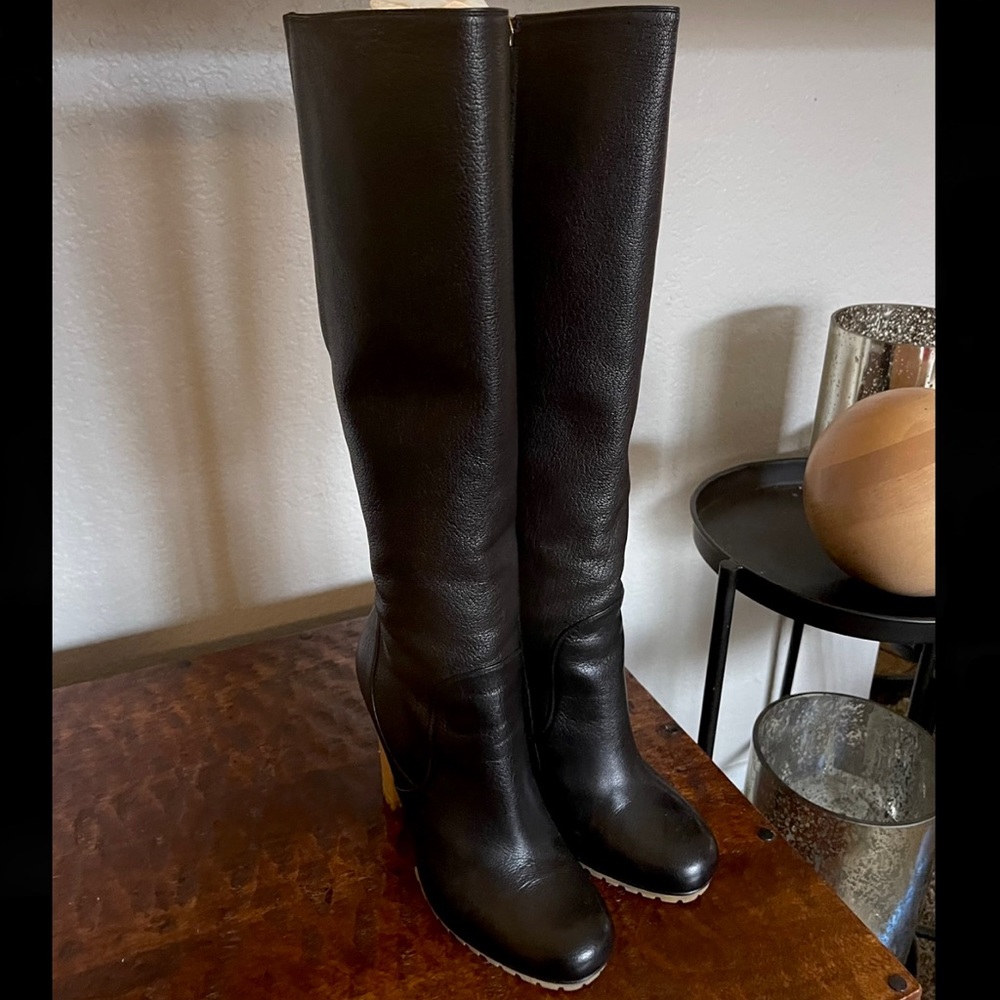 Knee High leather Gucci boots.
